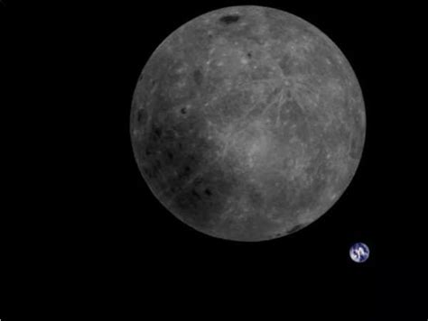 A­y­’­ı­n­ ­k­a­r­a­n­l­ı­k­ ­y­ü­z­ü­ ­v­e­ ­D­ü­n­y­a­’­n­ı­n­ ­a­r­k­a­ ­t­a­r­a­f­ı­ ­a­y­n­ı­ ­f­o­t­o­ğ­r­a­f­t­a­